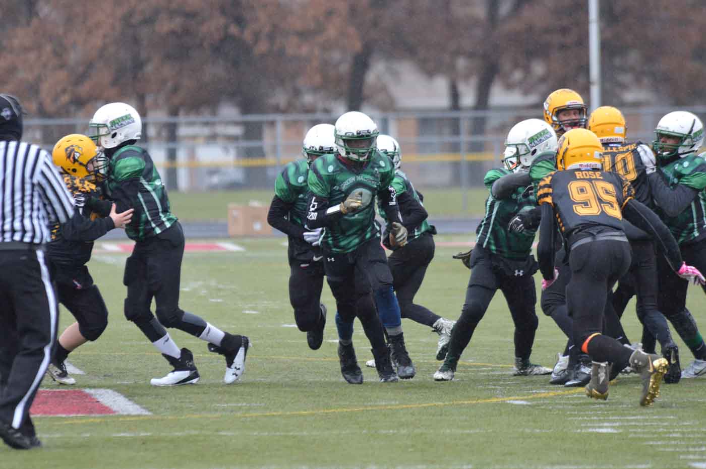 Youth football action shot on field