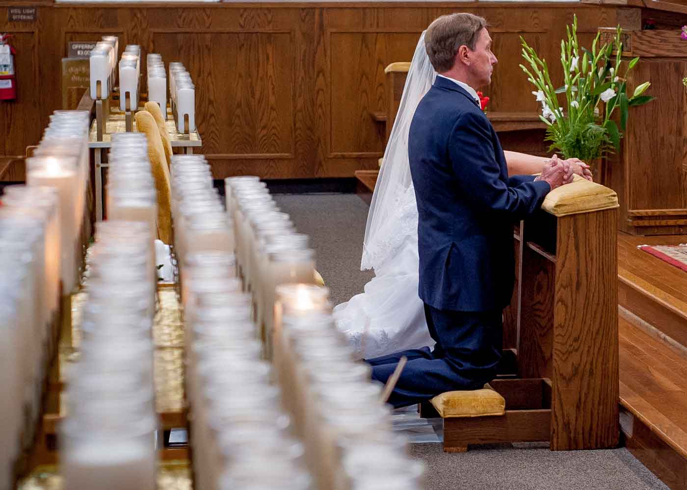 bride and groom kneeling