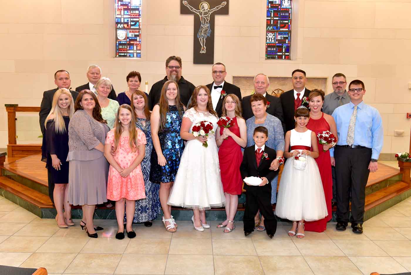 Group wedding photo on alter