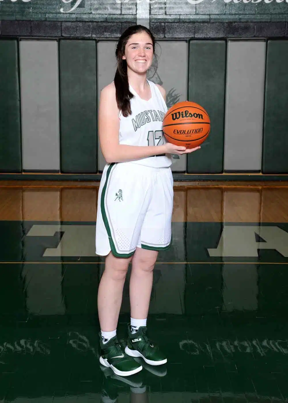 Mustangs basketball player sport by Tom Killoran Photography
